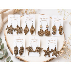 Boucles d'oreilles esprit de l'océan en bois gravé